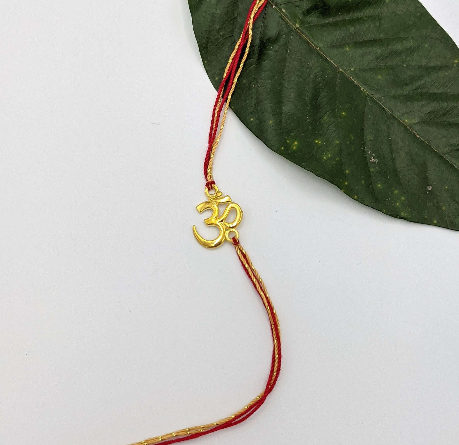 rakhi gold